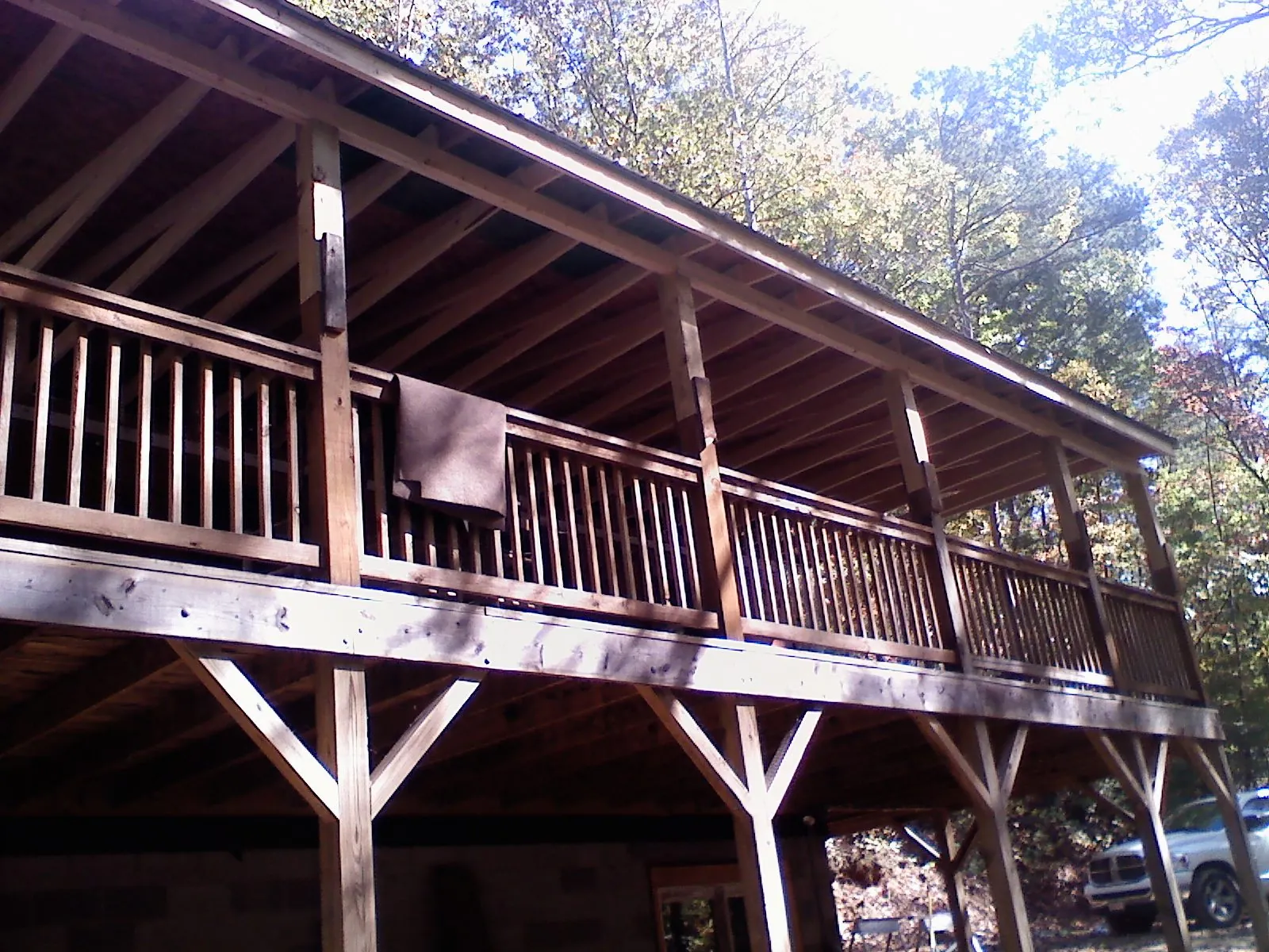 Timber framing under a new elevated porch and deck — Roof Leak Repair in Allred by Roofing Brothers